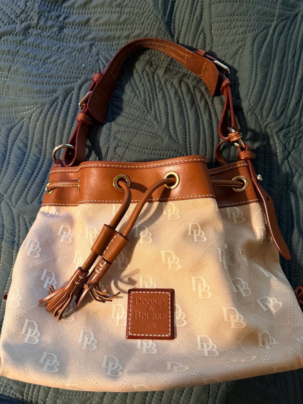 Dooney & Bourke Beige Canvas and Brown Leather Drawstring Shoulder Bag